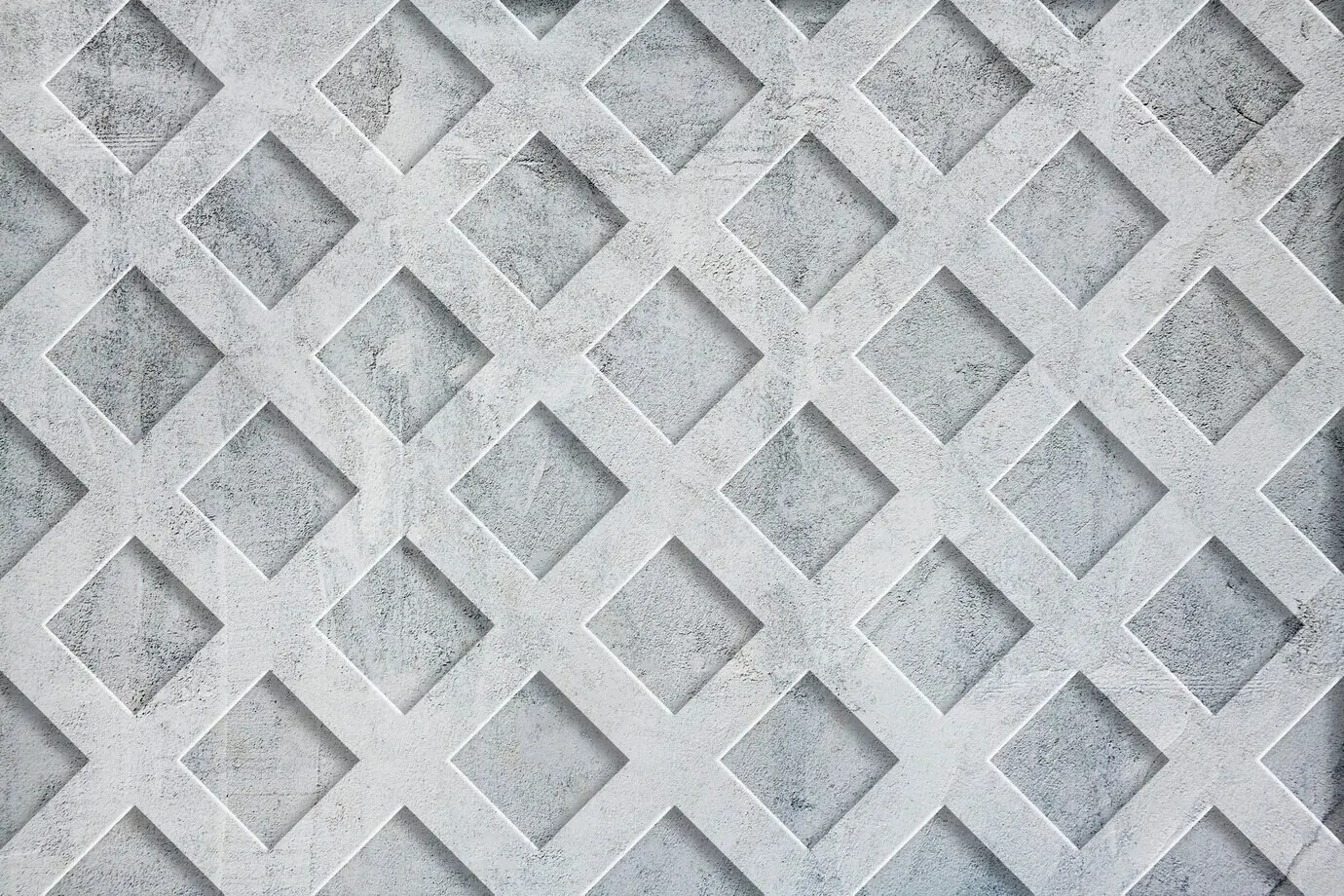 Grauer Wandhintergrund mit Zementstruktur und Gittermuster